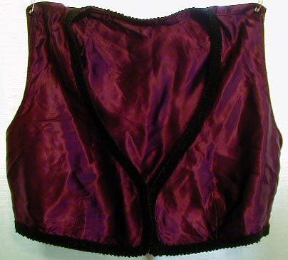 Purple/Wine Satin Vest. Made of boroque satin. Hook and eye closure. can be worn over a blouse similar to what the Awalim wore in the 1800's. Matches pants featured above. Size: Small.
Cost: \\$20.00 plus shipping.

